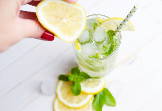 Homemade lemonade with ice in glass