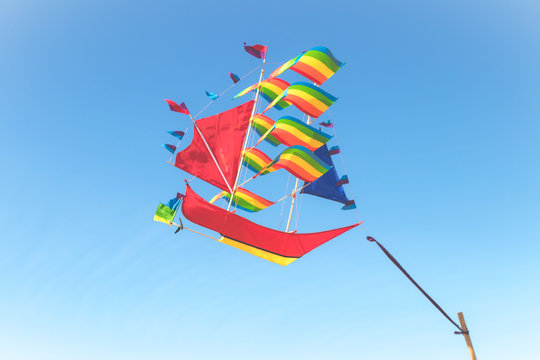 Kite flying in the clear blue sky on a tropical Bali island, Indonesia.
