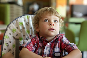 Kid in highchair