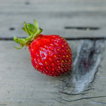 Strawberry on the old table