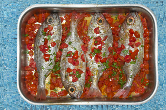 Gilthead breams ready to be cooked.