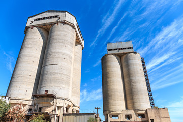 Two concrete towers of agricultural elevator 