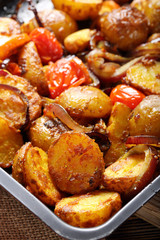 Baked potatoes with vegetables and curry spice