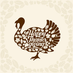 Typography of Thanksgiving. Beautifully decorated holiday text with autumn elements.