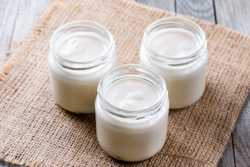 Obraz na płótnie Canvas Milk pudding in glass jars