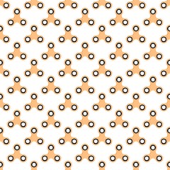 Background from orange children fidget spinners on white background. Playing backdrop of hand twisting toys with bearings in a row next to each other and alternately under him 