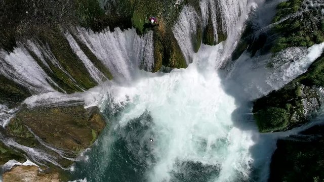 aerial drone flying over beautiful waterfall strbacki buk in bosnia and herzegovina cristal clear drinking water on wild river waterfalls