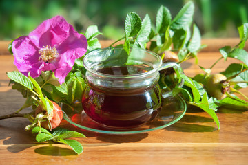 Healthy tea of dogrose berries. Herbal medicine.