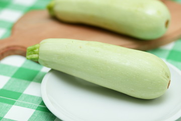 Green courgettes chopped before cooking in the home kitchen