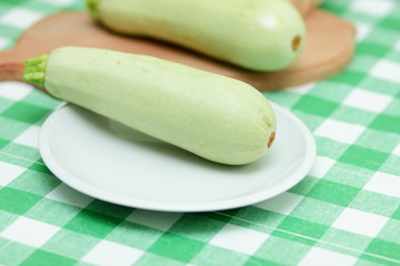 Green courgettes chopped before cooking in the home kitchen
