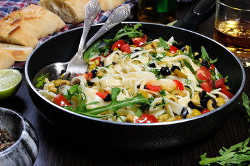 Pasta with olives and tomatoes