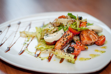 fish salad with grilled salmon and green salad
