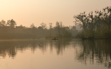 Obraz na płótnie Canvas Sunrise on a foggy morning at Swamp