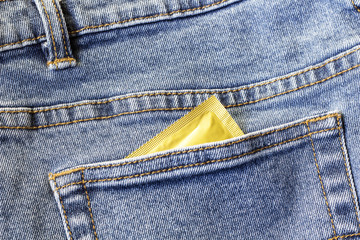condom in blue jeans pocket