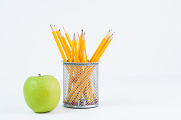 pencils and an apple for back to school