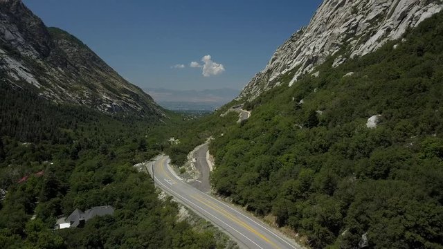 Aerial Little Cottonwood Canyon Utah view valley. Road to facility. Granite Records Vault Mountain a solid rock 600 foot tunnel Little Cottonwood Canyon. LDS or Mormon church stores records.
