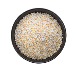 White sesame in a bowl on white background