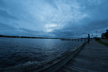 Obraz premium Stormy night on the boardwalk