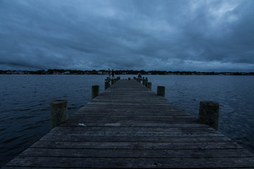 Naklejka premium Stormy night on the boardwalk
