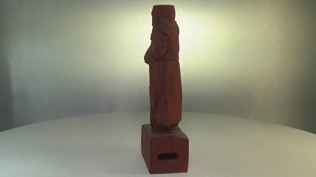 Woodcarving paduk. Figurine of a knight with a shield carved from a tree.