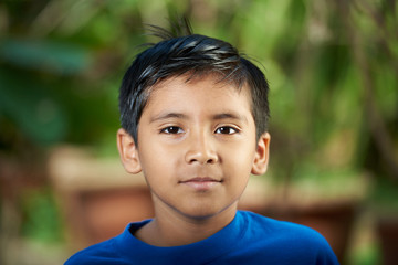 Attractive hispanic boy portrait - Powered by Adobe