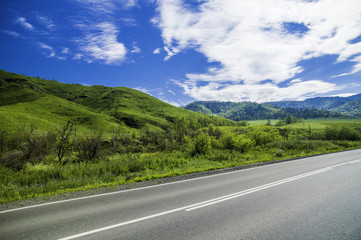 Asphalt road in the mountains of Altai