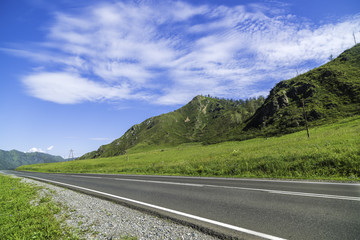 Asphalt road in the mountains of Altai