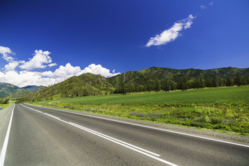 Asphalt road in the mountains of Altai