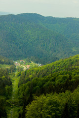 Obraz premium Small village in the mountains in the summer