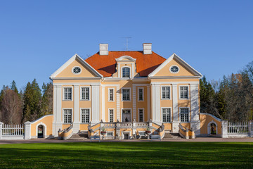 Fototapeta na wymiar PALMSE, ESTONIA - OCTOBER, 20, 2016: Rich estate with a park at sunny summer day.