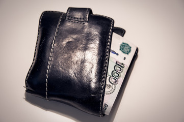 leather purse with Russian rubles