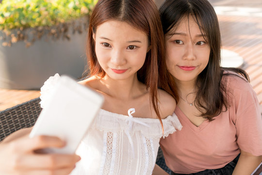tow girls  making selfie