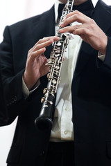 Fototapeta premium Human Hand playing the oboe