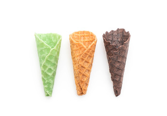 originan, green tea and chocolate wafer cone on white background