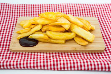 Golden French fries potatoes ready to be eaten