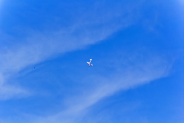 Military airplane in blue sky
