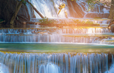 Close up multiple layers waterfall in tropical deep forest national park