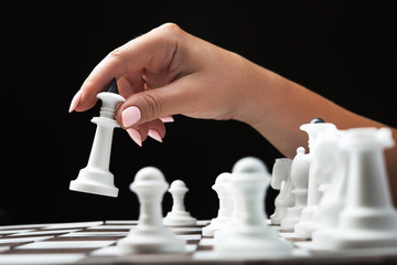 Woman plays chess