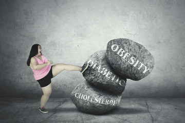 Fat woman fighting with her problem