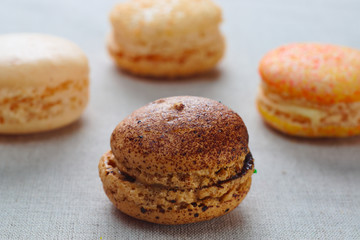 Assortment of macaroons to the delicious taste caramel.