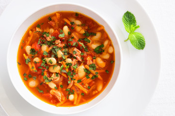 beans, pork, and tomato soup with mint