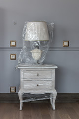 lamp on a white original bedside table