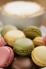 mixed macarons in bowl closeup shot