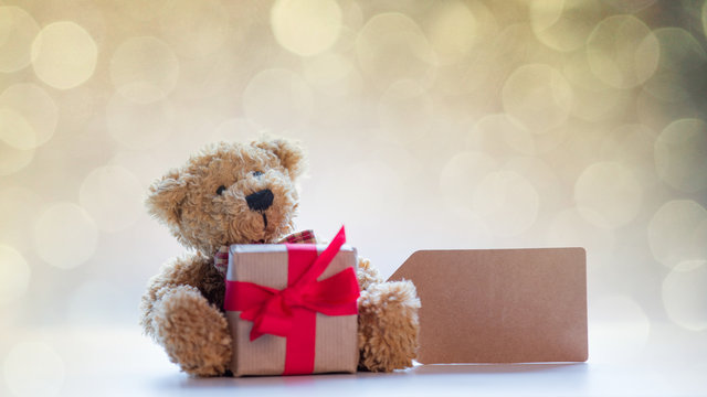 cute teddy bear with price tag and beautiful gift