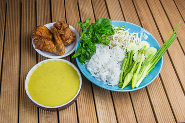 Thai rice vermicelli served with yellow curry, Thai Noodle. Fried chicken