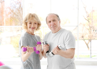 Elderly patients in rehabilitation center. Physiotherapy concept