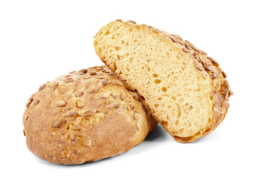 Tasty loaf of bread on white background