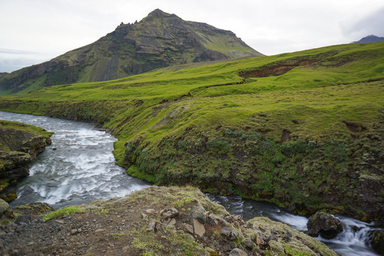 Mountain view of Skogarfoss waterfall, Iceland.