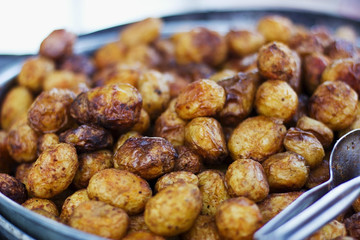Baked yellow brown young patatoes