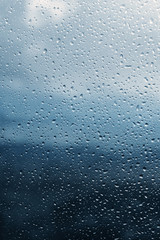 Raindrops on glass, background